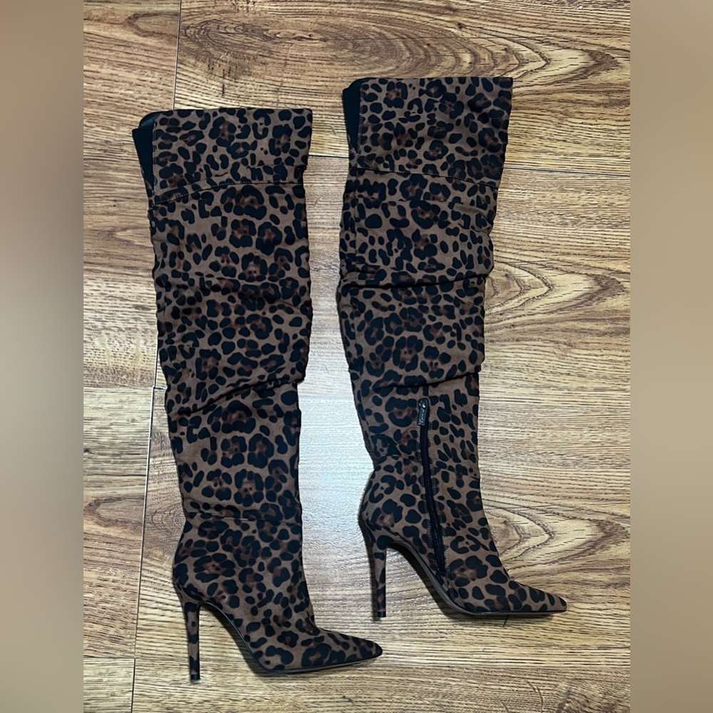 Jessica Simpson high heel boots over the knee